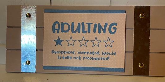 Adulting  Overpriced, overrated.  Would totally not recommend! sign - 1