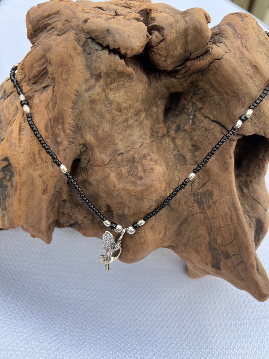 Beautiful sterling silver fairy charm necklace made with black seed beads and sterling silver beads  - 1