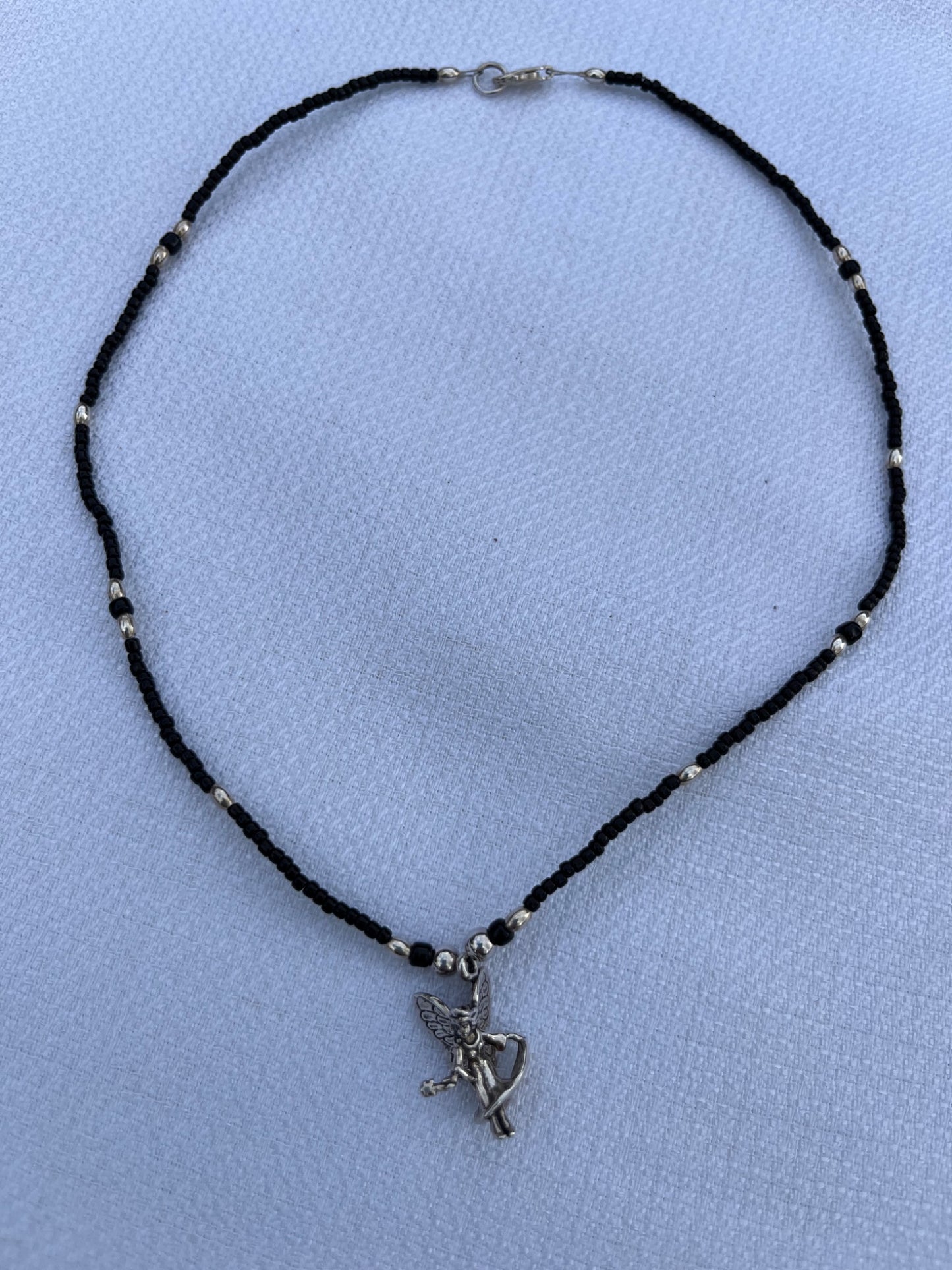 Beautiful sterling silver fairy charm necklace made with black seed beads and sterling silver beads  - 2