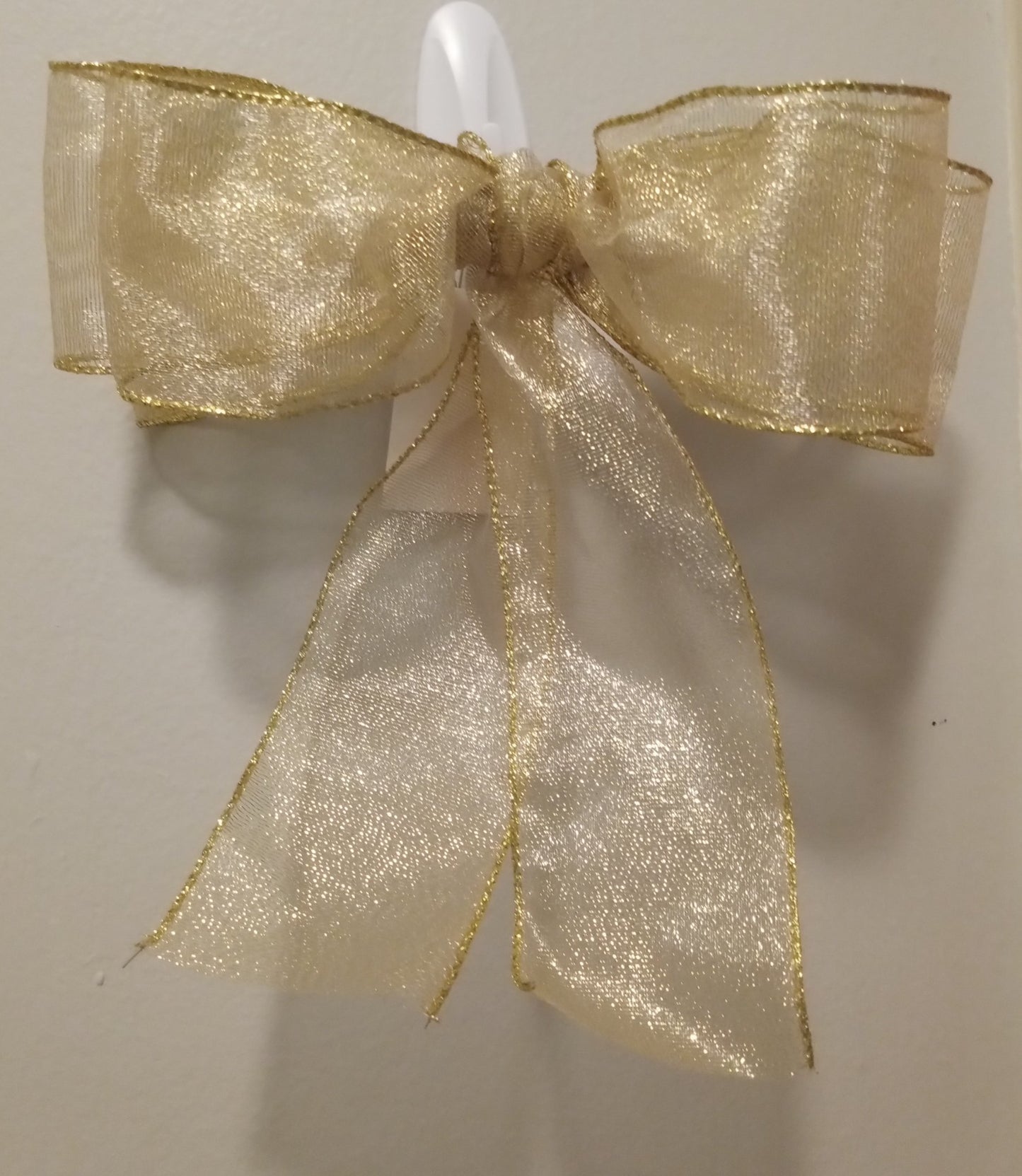 Gold ribbon bow - 1